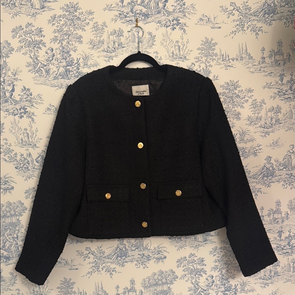 Elegant Black Jacket with Gold Accents